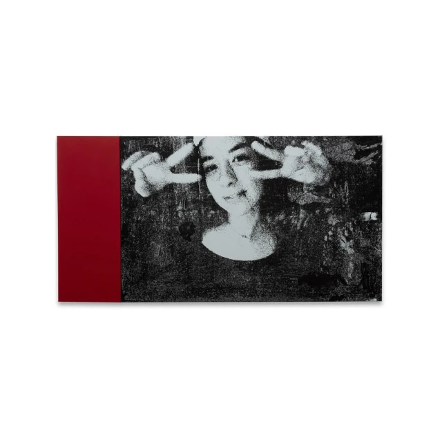 Monochromatic graphic art features a person making a peace sign against a grungy black-and-white backdrop with a red bar on the side.