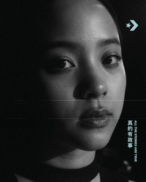 Striking black and white portrait of an Asian woman with a Converse logo, accented by Chinese text and the brand's slogan.