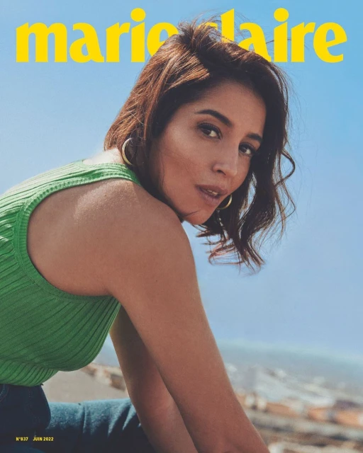 Magazine cover featuring a woman in a green top looking at the camera, with a blue sky background and Marie Claire masthead.