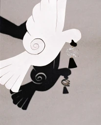 Paper art collage featuring a white bird cutout overlapping a black bird shadow holding a drop earring