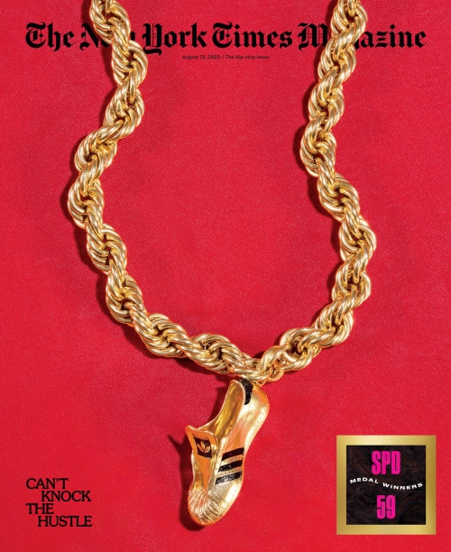 The New York Times Magazine cover featuring a gold rope chain with a gold Adidas sneaker pendant on a red background.