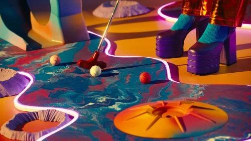 Whimsical miniature golf scene featuring colorful putt-putt course, golf balls, club, purple platform shoes, and orange background elements.