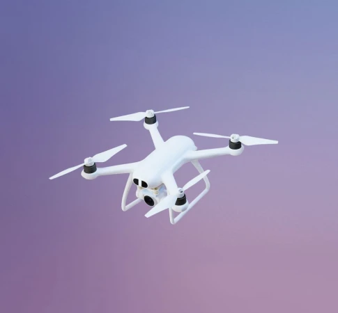 Drone against a purple-pink gradient backdrop. The drone is white with four propellers and a camera visible at the front.