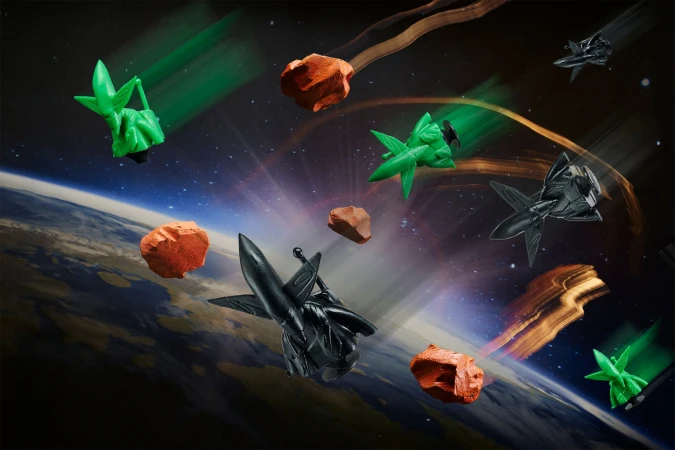 Computer-generated image of spaceships, asteroids, and a glowing planet Earth set against a star-filled backdrop.