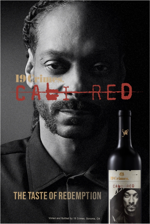 Close-up of Snoop Dogg and a bottle of Cali Red wine in a promotional poster with a dark, monochromatic palette and bold red text.