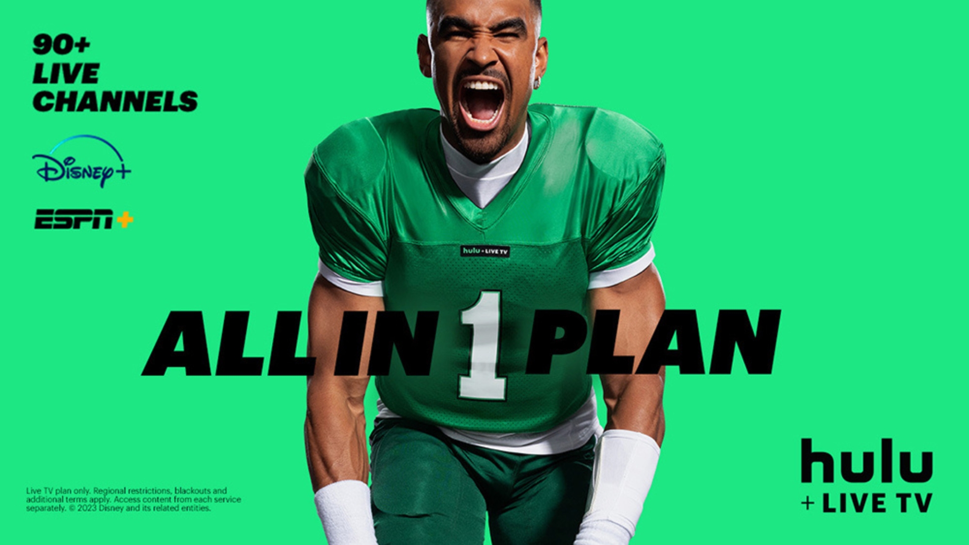 Football player in uniform shouts with Hulu + Live TV advertisement featuring Disney+ and ESPN against a green background.