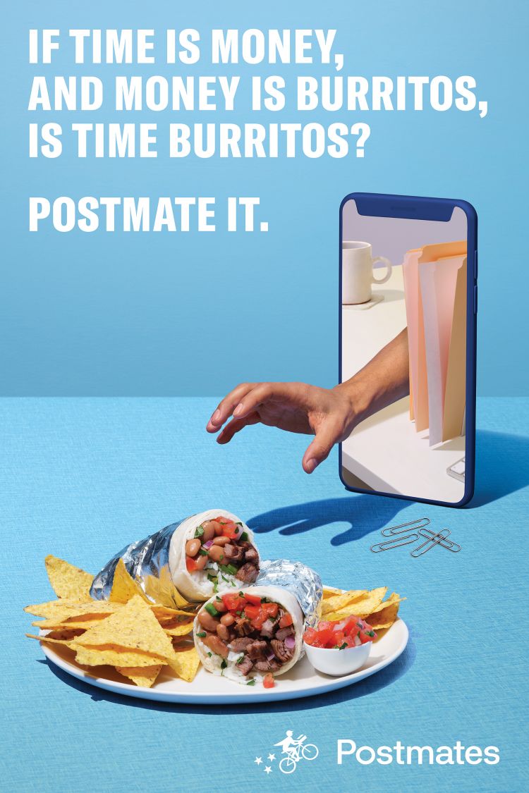 Promotional still life photo featuring a plate of burritos and chips with a human hand reaching from a phone, all against blue backdrop.