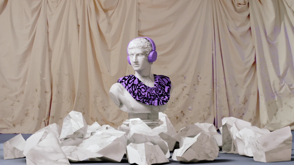 Bust sculpture with purple headphones and patterned collar, staged against draped fabric and faux stone fragments in a studio setting.
