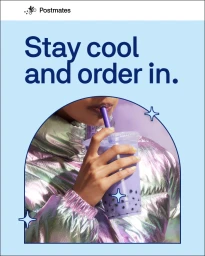 Close-up of a person drinking purple boba tea through a straw, wearing a metallic iridescent puffer jacket against a pale background.