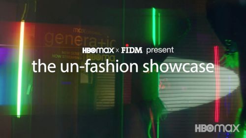 Promotional image for the 'Un-Fashion Showcase' with bright neon lights and visible brand logos. Genera+ion and HBOMax are visible.