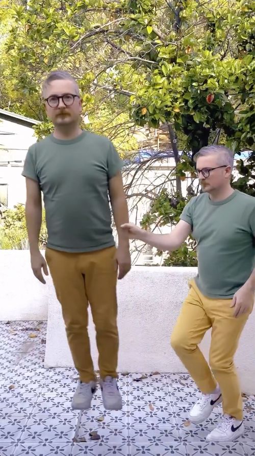 An adult male appears in two instances in a digitally altered image, standing on a patterned surface with greenery visible behind.