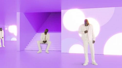 Three African American men in a violet interior space with white geometric shapes and white clothing, two are standing and one is seated.
