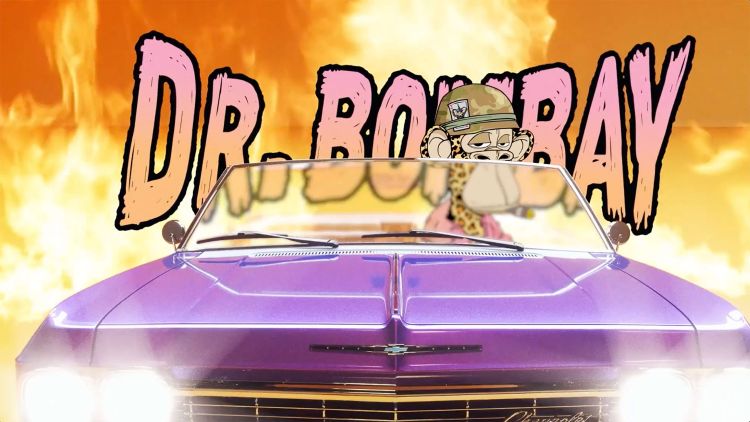 Animated scene featuring a purple Chevrolet Impala with 'DR. BOMBAY' text, a cartoon ape in a helmet, and a vibrant, fiery background.