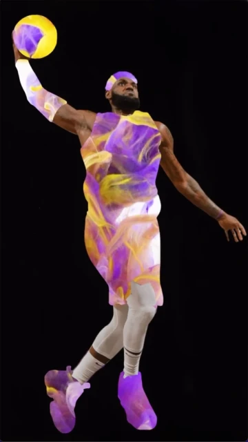 Basketball player mid-air holding a ball in an action shot against a black backdrop, showcasing athletic skill and motion in sports.
