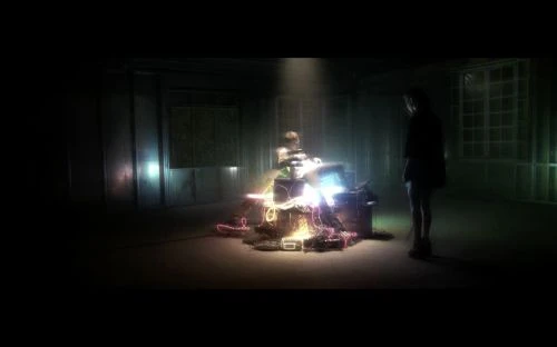 Two people in a dimly lit room with computer equipment and neon lights, creating an eerie atmosphere in an indoor setting.