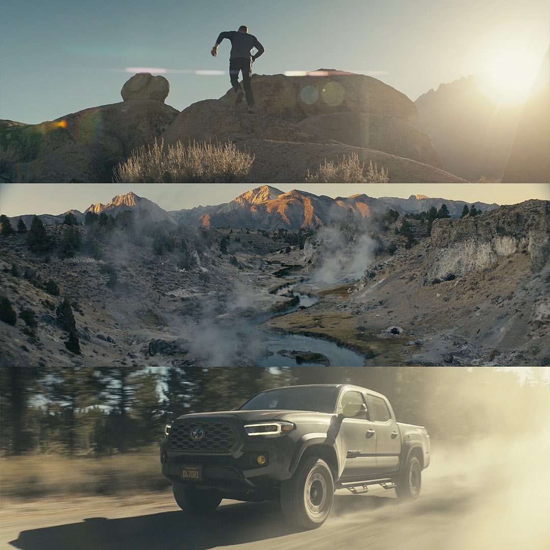Split-view of a man on rocks, mountainous landscape with stream, and a truck driving on dirt road in a sunny, outdoor setting.