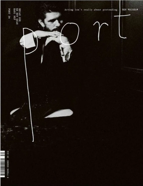 Magazine cover featuring a portrait of actor Ben Whishaw in a dark, shadowed setting, with bold white text overlay.