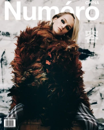 Magazine cover featuring a blonde woman in a feathery coat, with "Numéro China" in white text at the top and a textured background.
