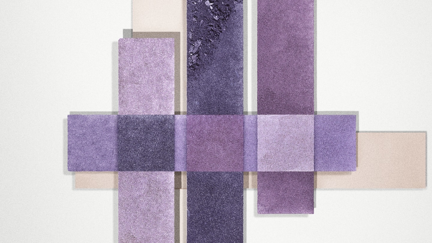 Abstract composition of purple and beige rectangles in varying shades, creating a textured, geometric pattern on a white surface.