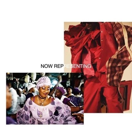 Indoor scene features a woman in a patterned dress and headwrap, surrounded by a crowd and a mannequin wearing red clothes.