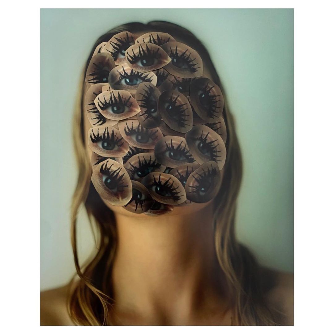 Surreal portrait of a woman with long blonde hair and a collage of many eyes covering her face, creating a unique and artistic image.