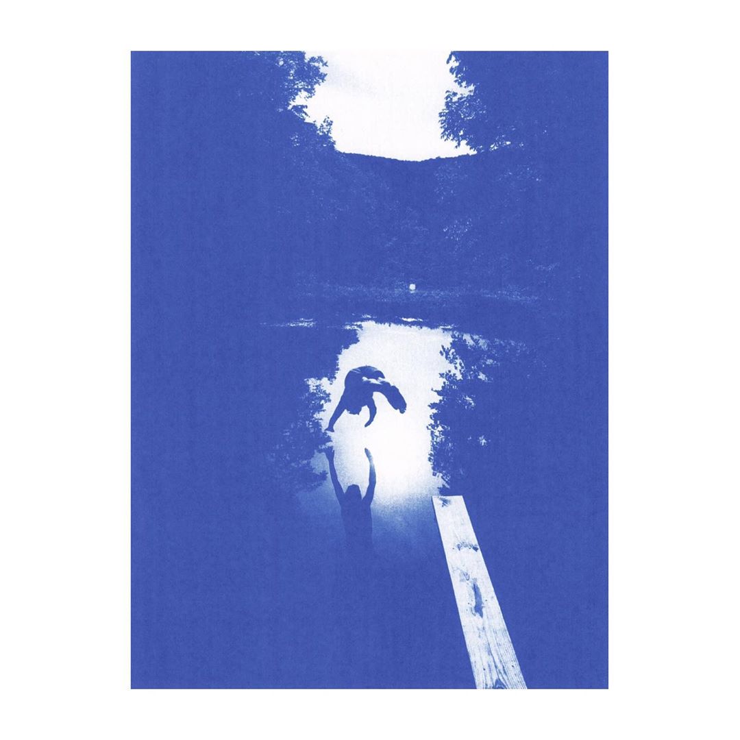 Monochromatic image of a person holding a child in water, with silhouetted figures against a bright light in a nature setting.
