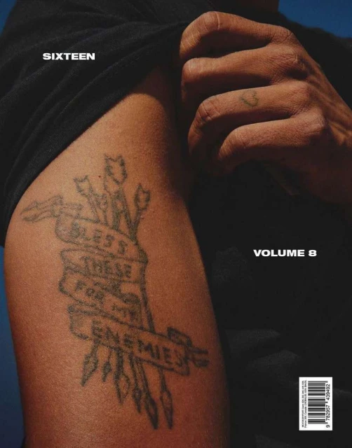 Magazine cover featuring a close-up of a man's arm with a tattoo, highlighting the design and text 'SIXTEEN VOLUME 8' against a blue gradient.