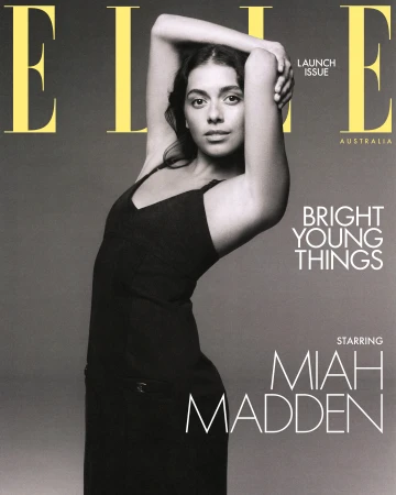 Black and white magazine cover featuring Miah Madden posing in a black slip dress against a grey studio backdrop.
