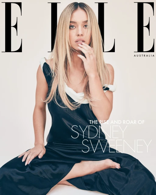 Sydney Sweeney graces the cover of Elle Australia, seated in a black dress against a cream backdrop with the magazine's logo prominently displayed.