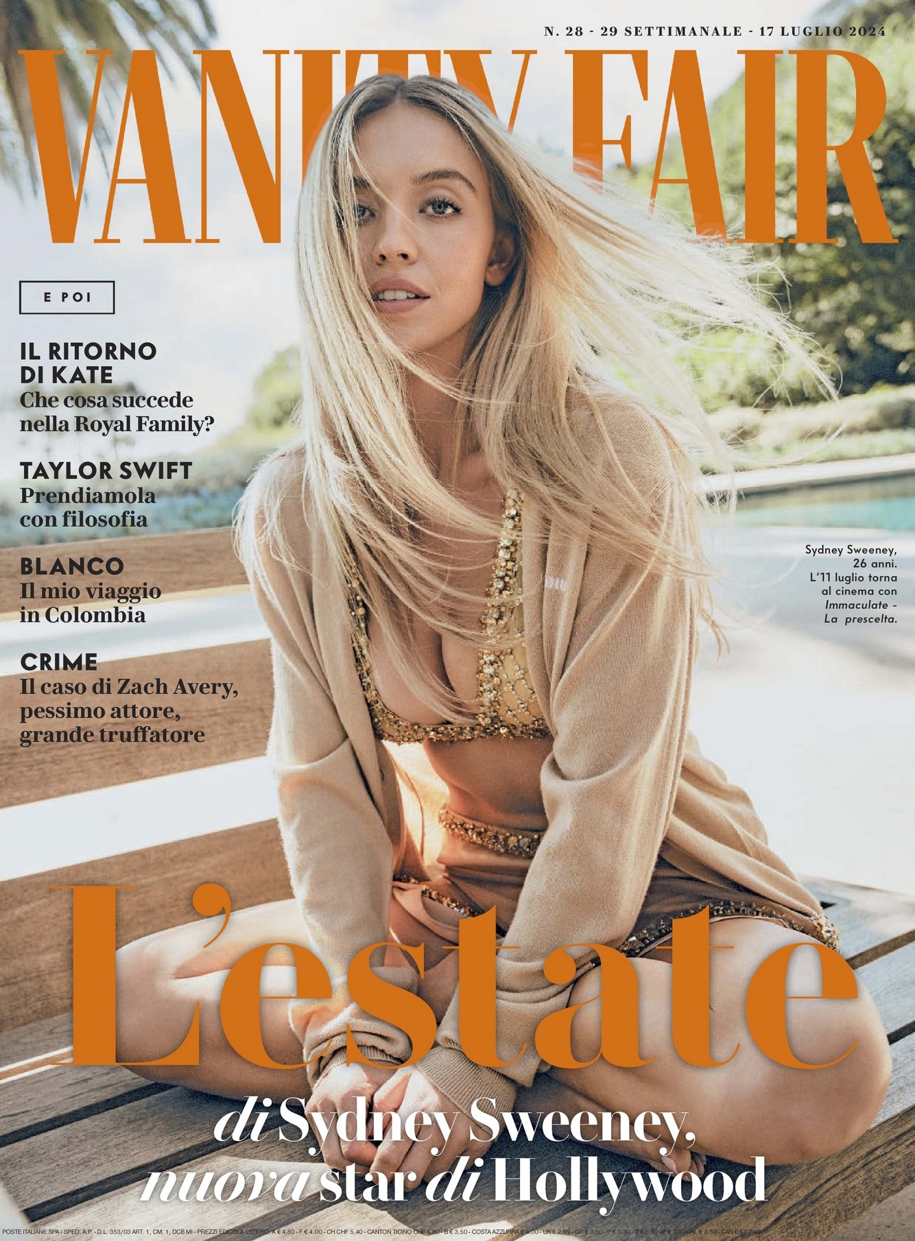 Vanity Fair magazine cover featuring Sydney Sweeney, blonde hair, wearing a beaded top and cardigan, sitting outdoors on wooden steps.