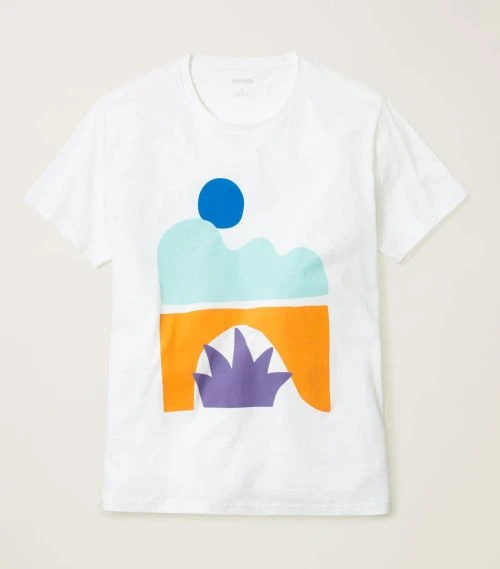White t-shirt with a graphic design featuring a blue circle, mint green cloud-like shapes, an orange rectangle, and a purple plant.