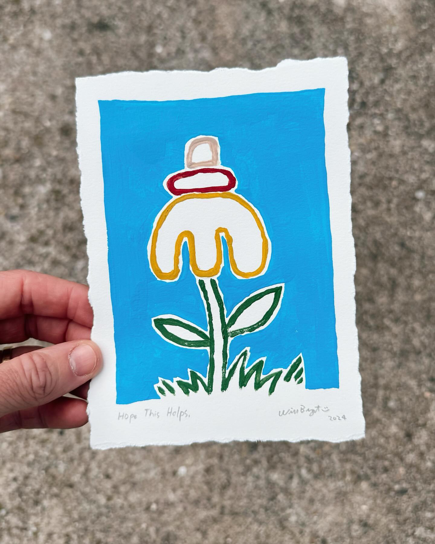 Illustration of a stylized flower with a blue background, painted on paper, held by a person, showcasing a whimsical and colorful design.