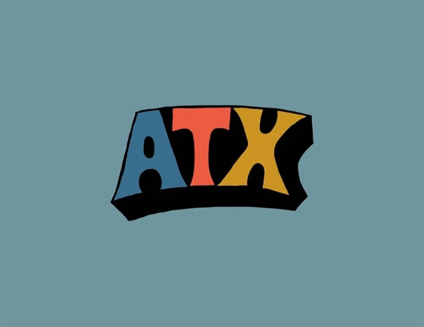 ATX logo in blue, orange, yellow, and black on a grey-blue background in a graphic design image with bold, cartoonish font.