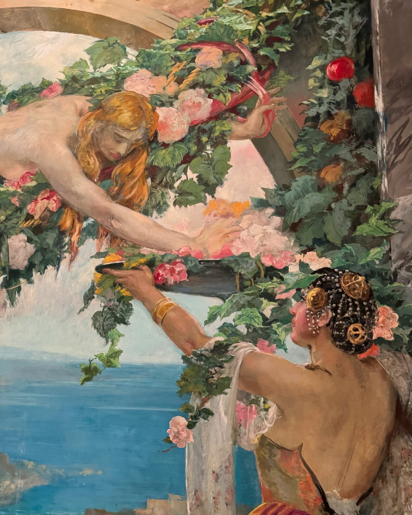 Painting featuring two light-skinned women surrounded by flowers and greenery, evoking a classical or allegorical theme with artistic brushstrokes.