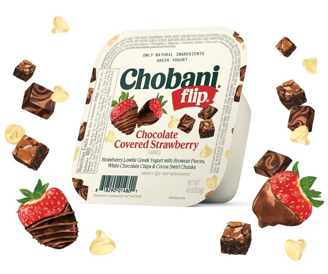 Chobani Flip yogurt cup featuring chocolate-covered strawberries, brownie pieces, and white chocolate chips, against a white backdrop.