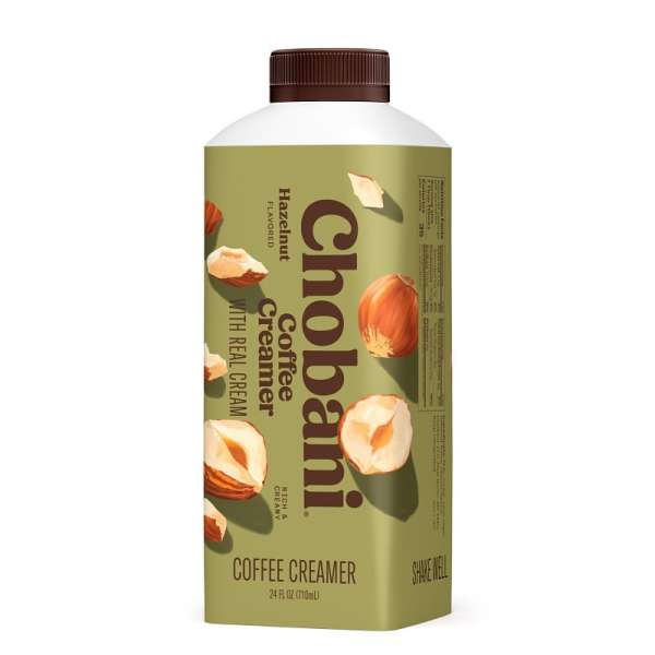 Chobani Hazelnut coffee creamer in a carton, showcased against a white background, with hazelnut images and a brown cap.