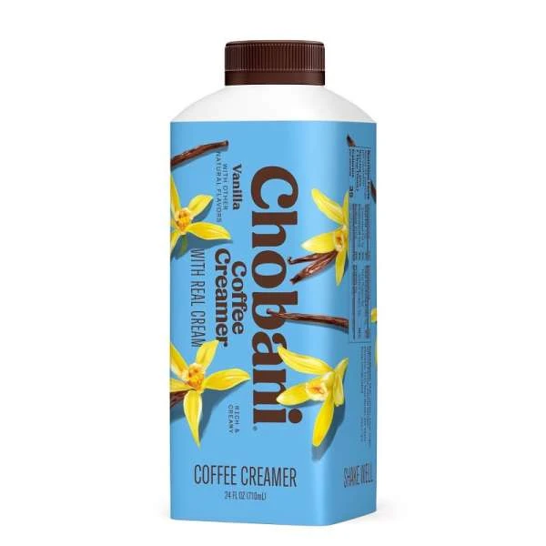 Chobani vanilla coffee creamer bottle with floral design and vanilla bean, isolated on a white backdrop, product photography.