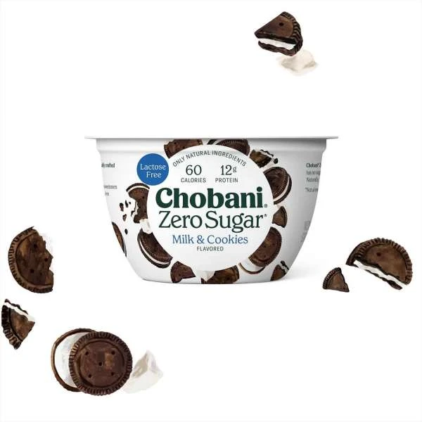 Chobani Zero Sugar Milk & Cookies yogurt cup with floating cookie pieces, set against a clean white background, product photography.