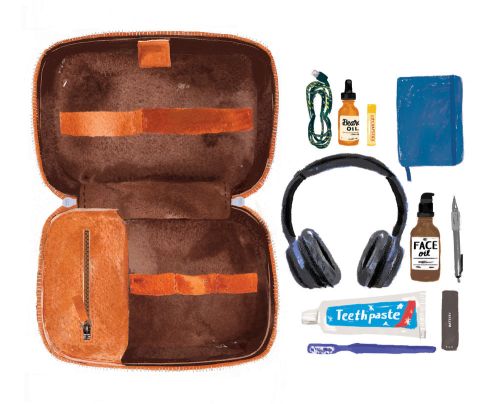 Illustration of an open brown leather toiletry bag, featuring items such as headphones, toothbrush, toothpaste, and skincare bottles, set on white.