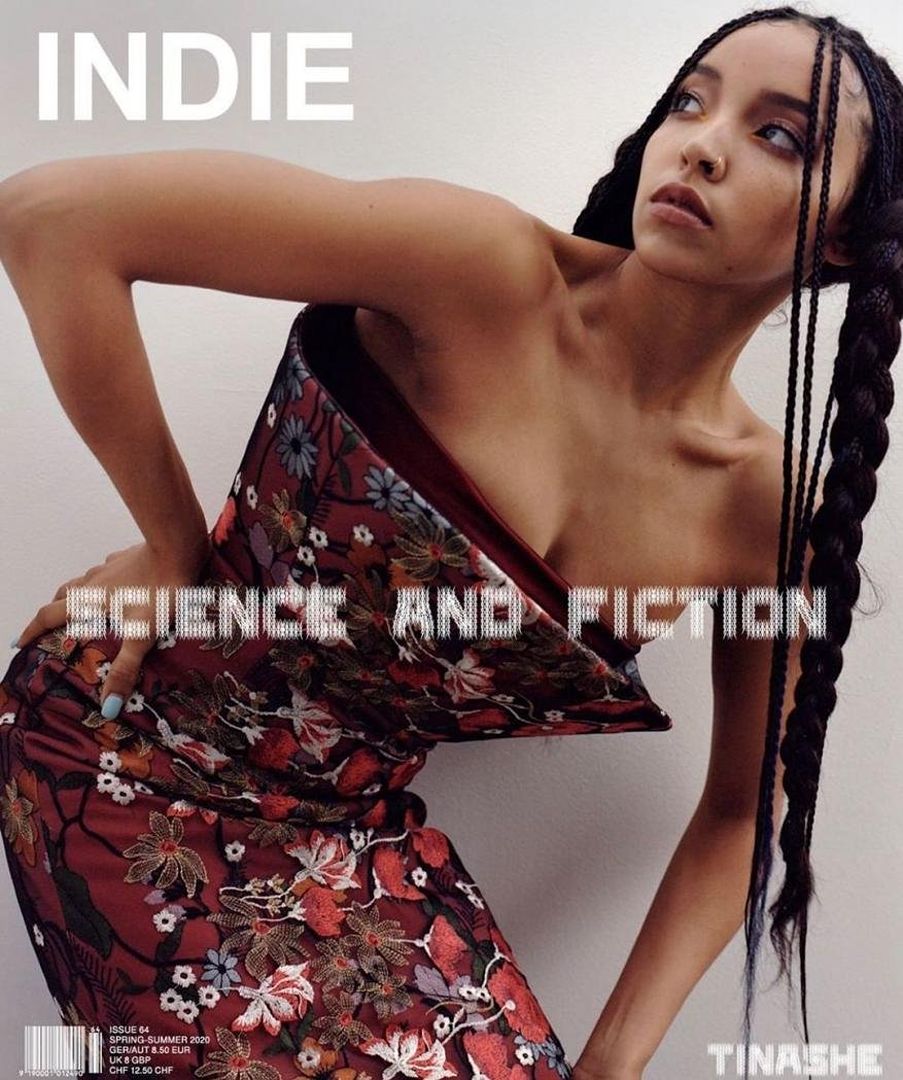 Magazine cover featuring a young adult woman with braids wearing a floral dress, set against a bright white background.