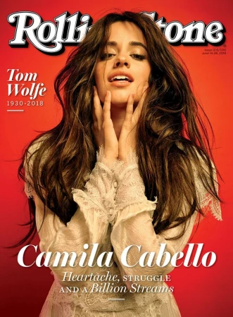 Camila Cabello cover of Rolling Stone magazine; brunette poses with hands near face against red backdrop with magazine masthead and titles.