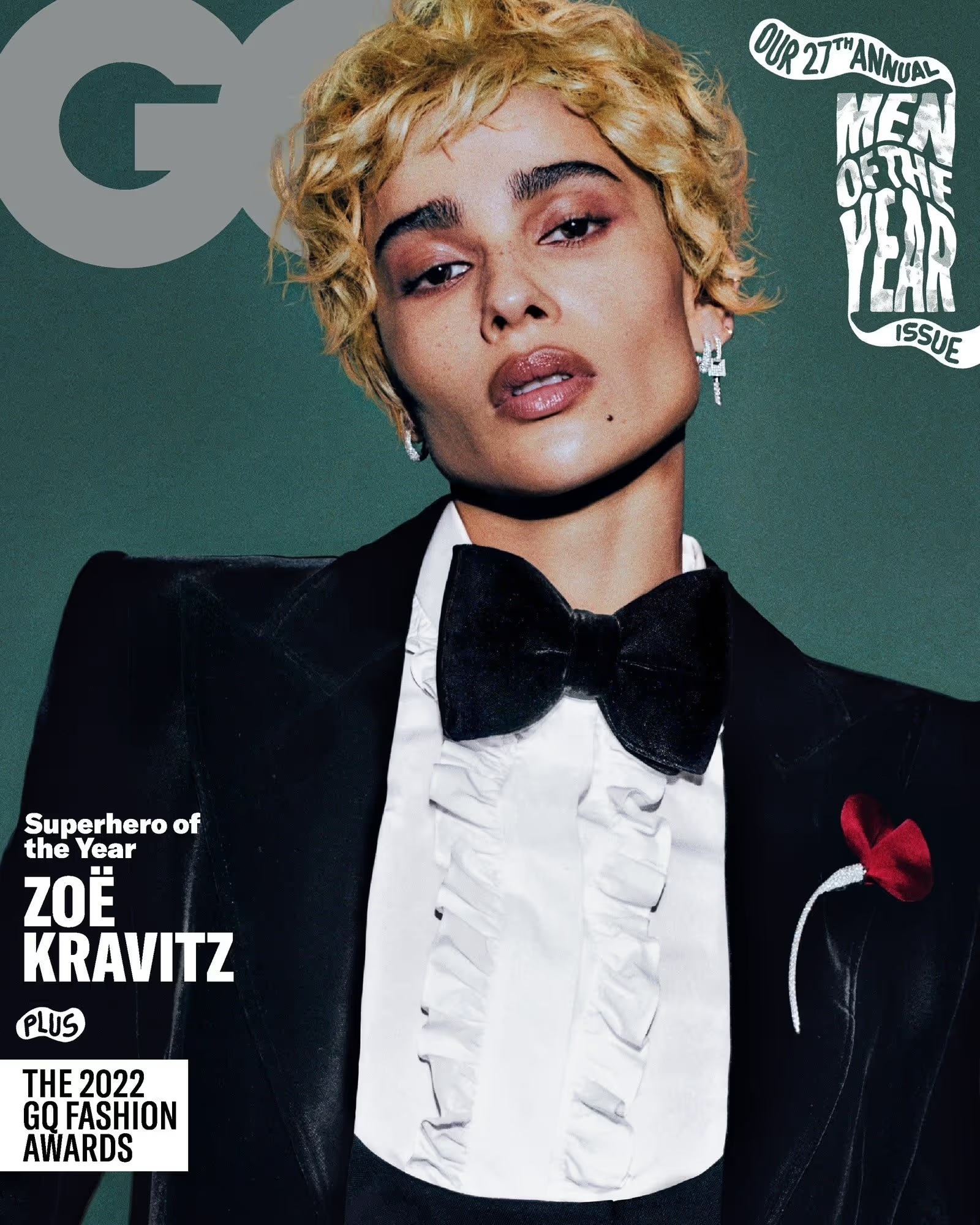 Zoe Kravitz cover photo for GQ magazine, wearing black tuxedo jacket, bow tie and white ruffled shirt in a close-up shot.