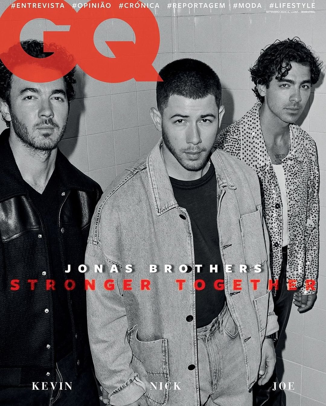 GQ cover featuring the Jonas Brothers, Kevin, Nick, and Joe, posing in a studio. The cover text is visible, with a black and white color scheme.