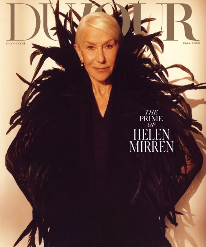 Helen Mirren on a magazine cover wearing a black feathered coat, fall 2023, dejour.com, studio lighting, elegant