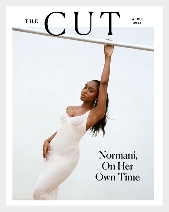 Magazine cover featuring Normani in a sheer dress, hanging from a bar against a light backdrop. The Cut, April 2024 issue.