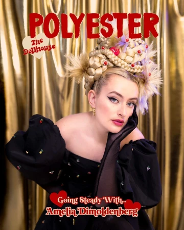 Magazine cover featuring Amelia Dimoldenberg with braided blonde hair, jewelry, and a black dress, set against a golden background.