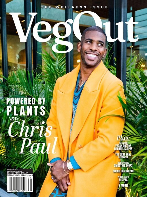 Magazine cover featuring Chris Paul in a yellow coat, VegOut headline, and plant theme. Indoor shot with natural light and cheerful vibe.