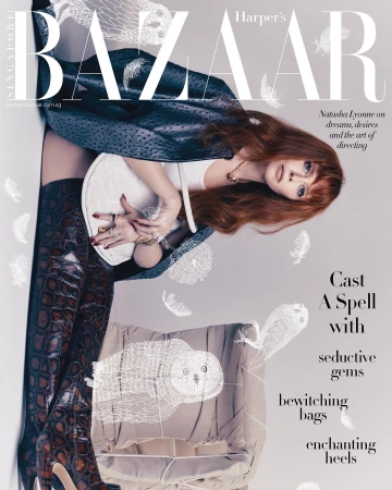 Natasha Lyonne featured on Harper's Bazaar Singapore cover wearing textured dark coat and thigh-high boots, styled by Cristina Ehrlich