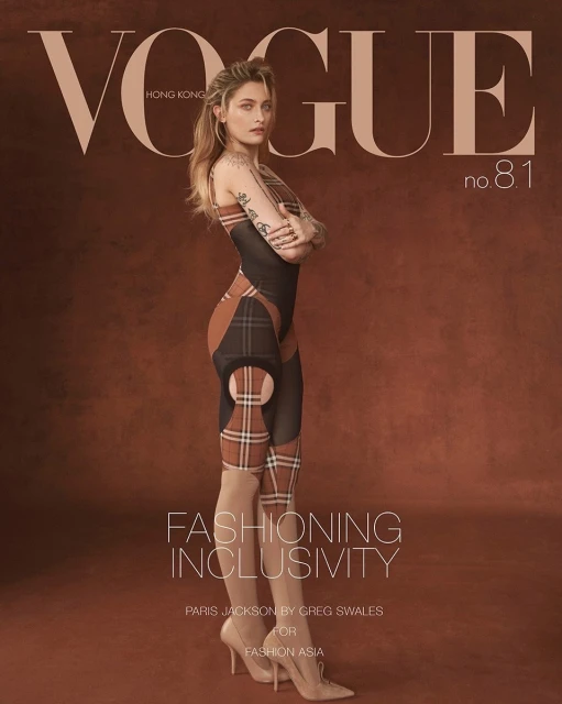 Vogue Hong Kong cover featuring Paris Jackson in a bodysuit and heels, posing in front of a brown backdrop with magazine text overlay.