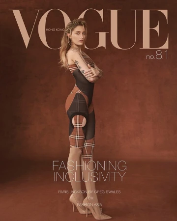 Vogue Hong Kong cover featuring Paris Jackson in a bodysuit and heels, posing in front of a brown backdrop with magazine text overlay.